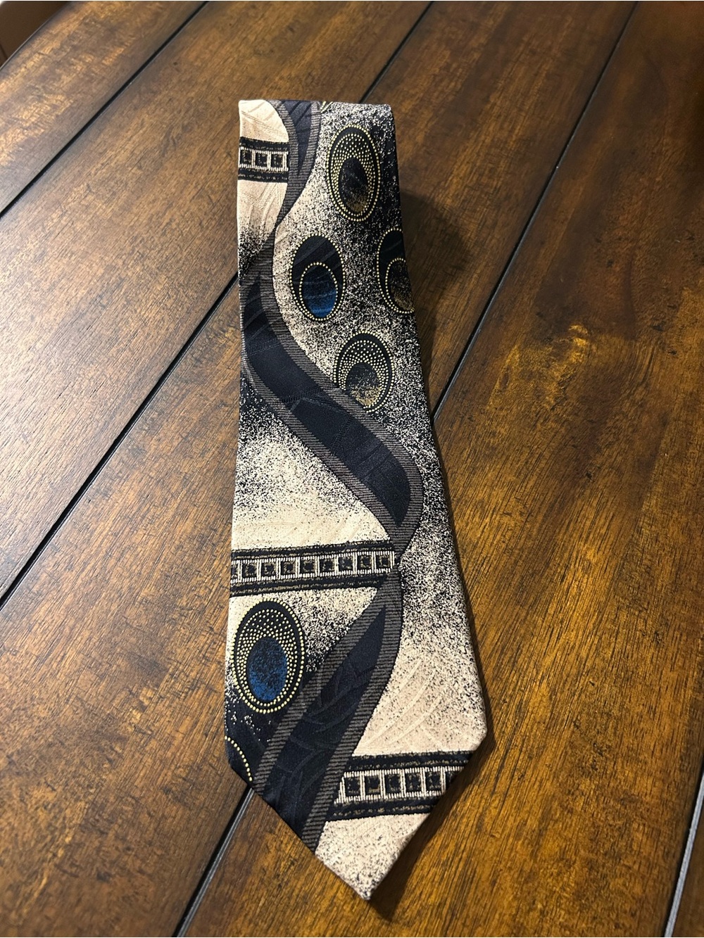 Patterned Beige and Black Men's Silk Tie with Blue Accents
